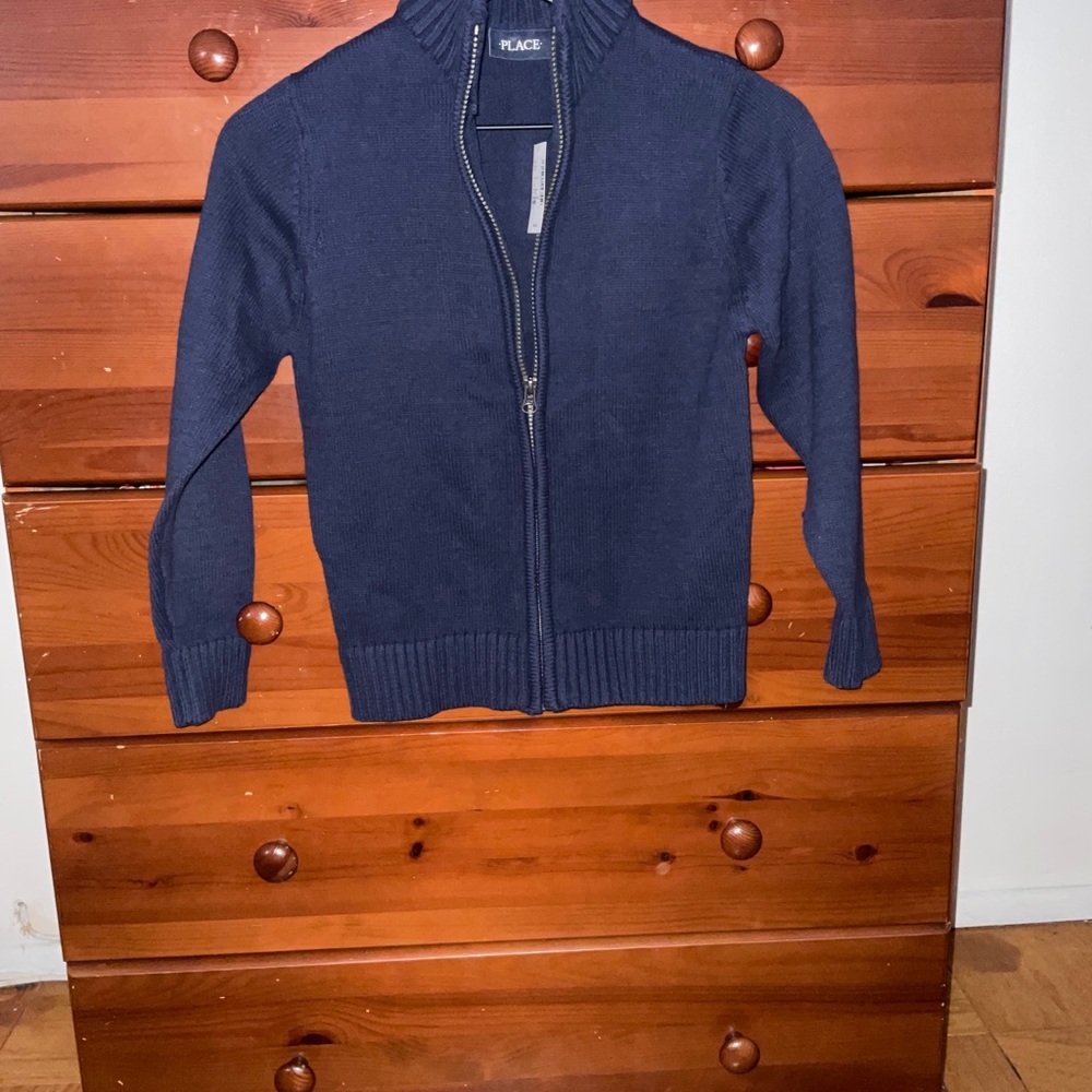 Brand new boys uniform zippered sweater. Size 7/8.
